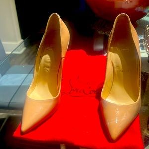 Original Christian Louboutin size 7. Worn twice. In Good condition.